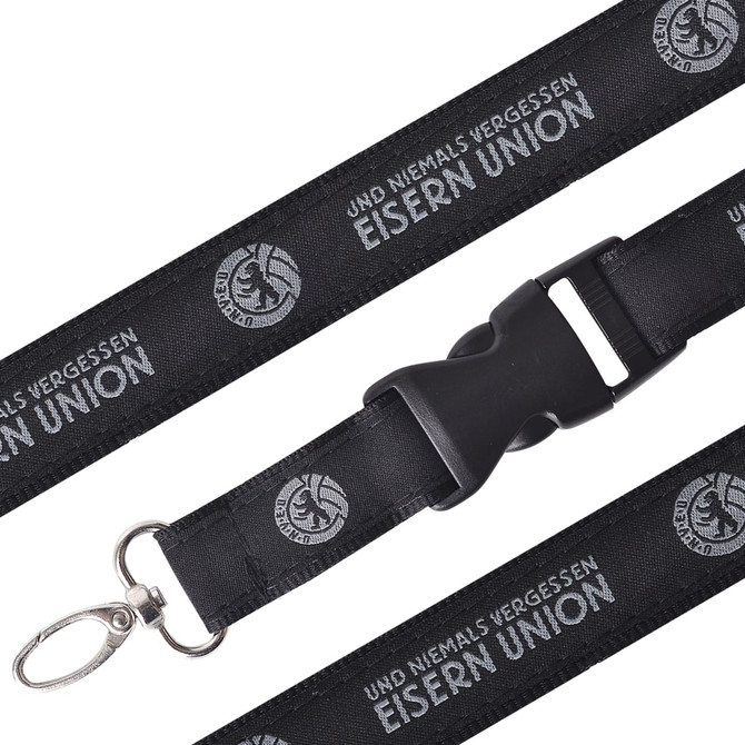 A black woven lanyard with a clip and a buckle, featuring a logo and text along its length.