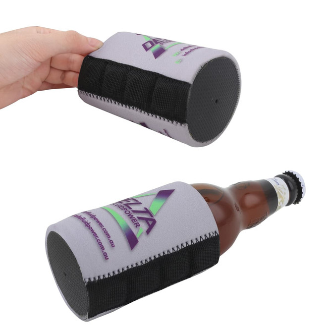 A grey stubby holder with black accents, featuring branding, designed to fit a drink bottle securely.