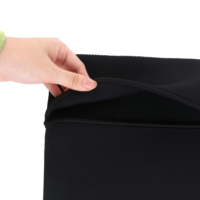 A black laptop bag featuring a hand opening the top flap, showcasing a smooth interior design.