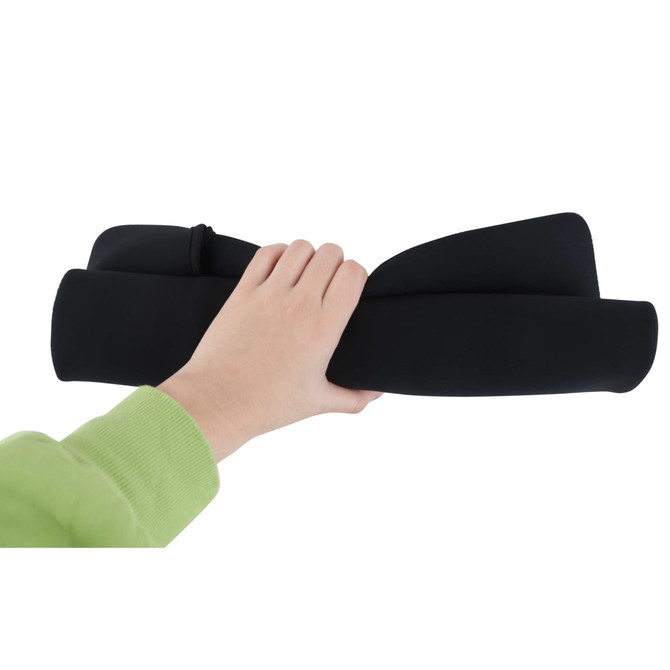 A black laptop bag held in one hand, featuring a sleek and smooth design. It has a logo on it.