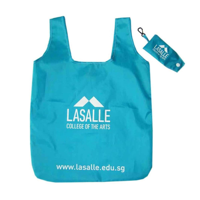 A turquoise foldable shopping tote bag with a logo and a small carrying pouch. A turquoise foldable shopping tote bag with a logo and a small carrying pouch.