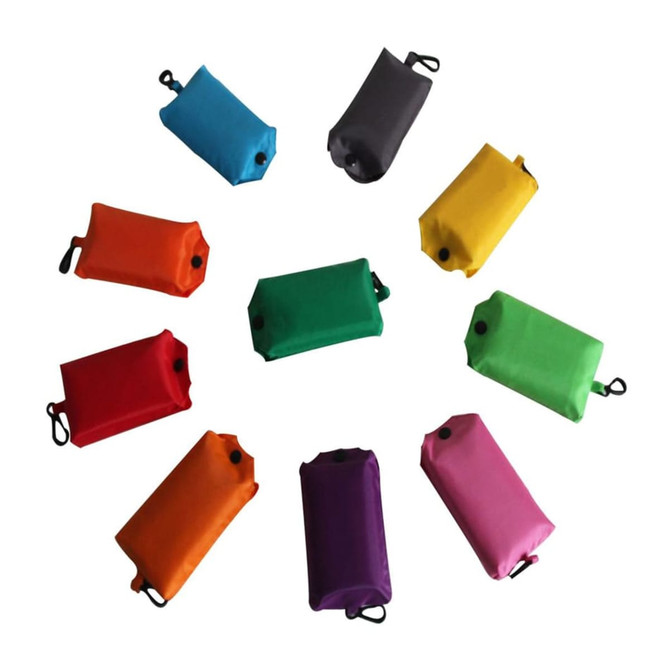 A collection of compact foldable shopping tote bags in various colours, including blue, green, orange, and purple, arranged in a circle. A collection of compact foldable shopping tote bags in various colours, including blue, green, orange, and purple, arranged in a circle.