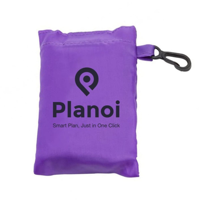A purple foldaway shopping bag with a clip, compactly stored in a small pouch featuring a logo. A purple foldaway shopping bag with a clip, compactly stored in a small pouch featuring a logo.