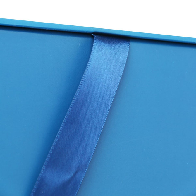 A blue custom gift box with a glossy finish and a matching satin ribbon. It features branding on one side.