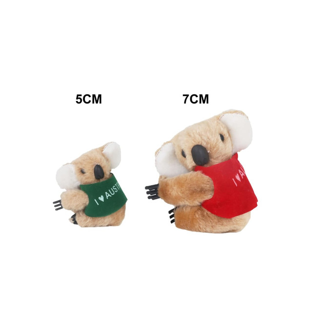 Two plush koala toys in green and red vests, measuring 5cm and 7cm, featuring clip-on backs.