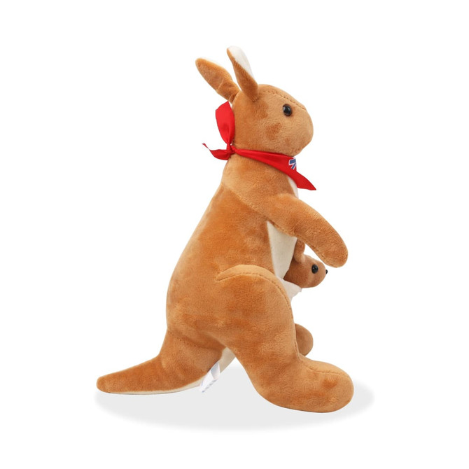 A plush kangaroo toy in tan colour, featuring a red scarf and a small joey peeking from its pouch.