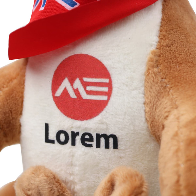 A plush kangaroo toy with brown fur and a white belly, wearing a red scarf and featuring a logo on its chest.