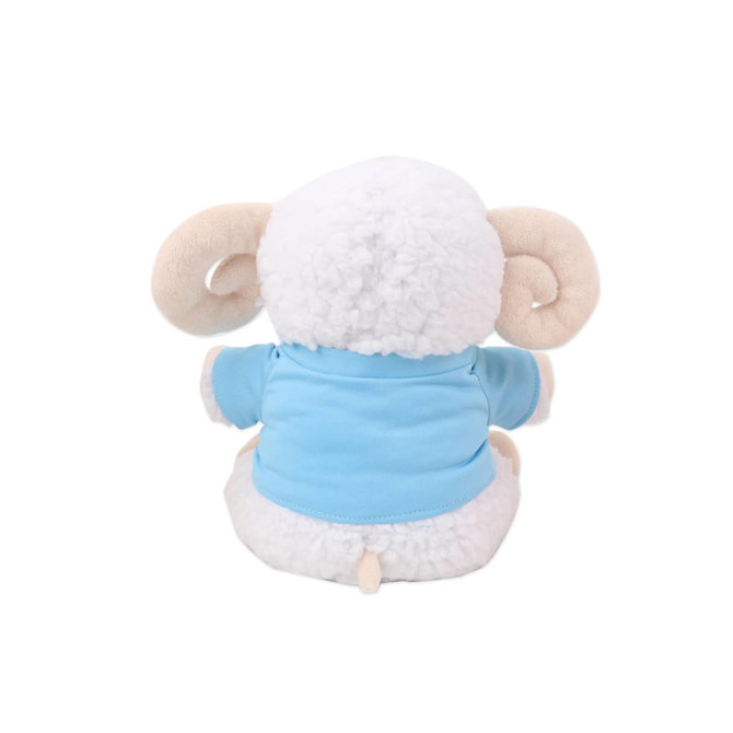 A plush toy shaped like a sheep, featuring fluffy white fur and a blue shirt, with distinctive beige horns.