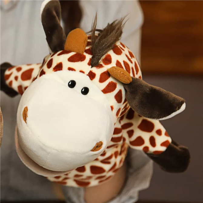A plush giraffe hand puppet featuring a spotted pattern in orange and brown with a friendly facial expression.