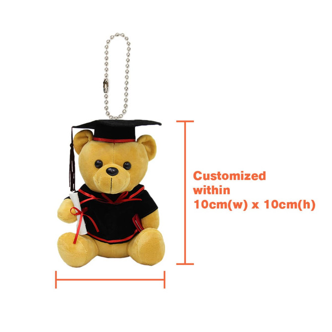 A plush bear keyring in graduation attire, featuring a black cap and gown, with a chain for attachment.