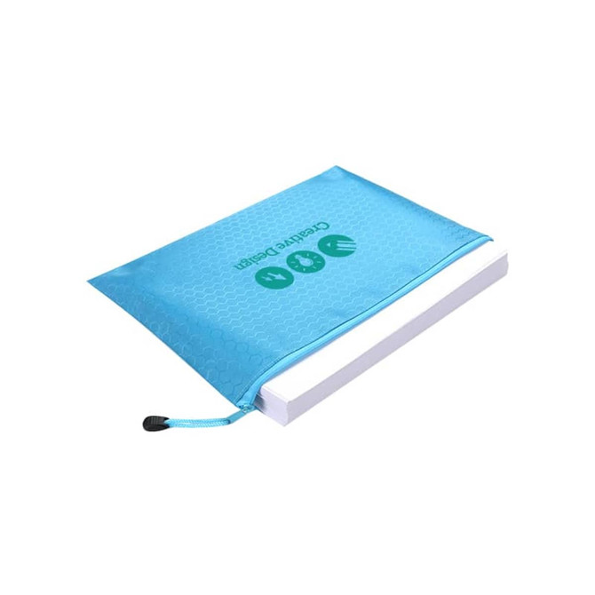 A light blue zip bag with a textured design, containing a white notepad and featuring a logo.