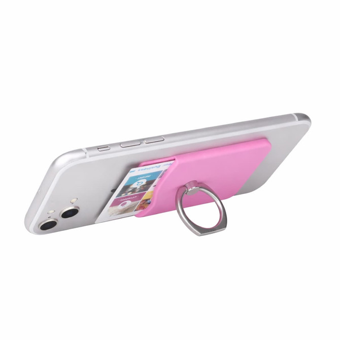 A pink smart wallet with a ring attached, fitted on a smartphone, holding a card.