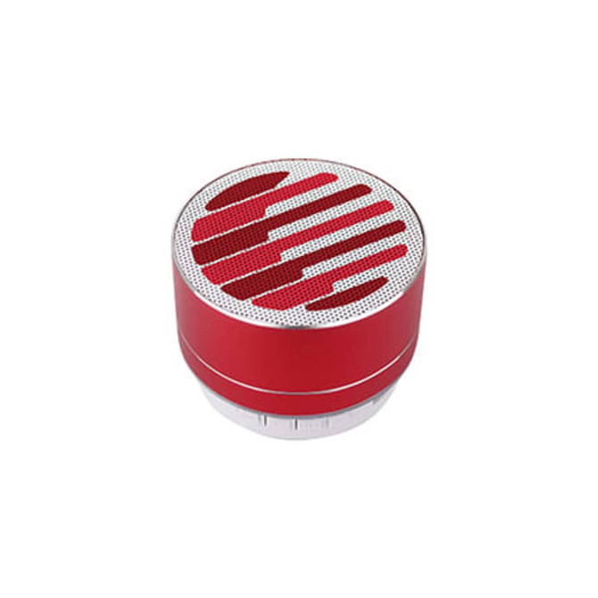 A red metal Bluetooth speaker with a textured circular top and control buttons at the base, featuring a logo.