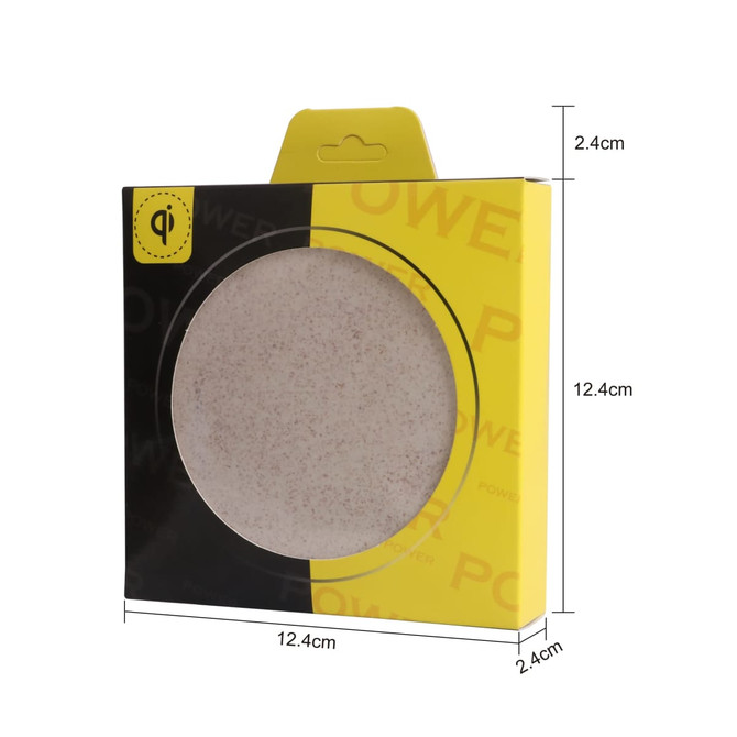 A round wheat straw wireless charger in a black and yellow box, with dimensions displayed on the packaging. A round wheat straw wireless charger in a black and yellow box, with dimensions displayed on the packaging.