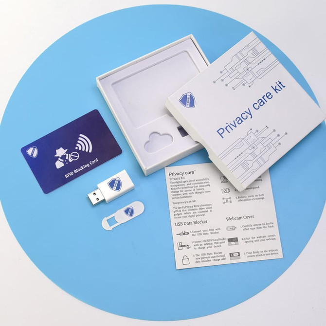 A RFID Promo Set featuring a USB drive, RFID blocking card, webcam cover, and instruction booklet, all in a white box.