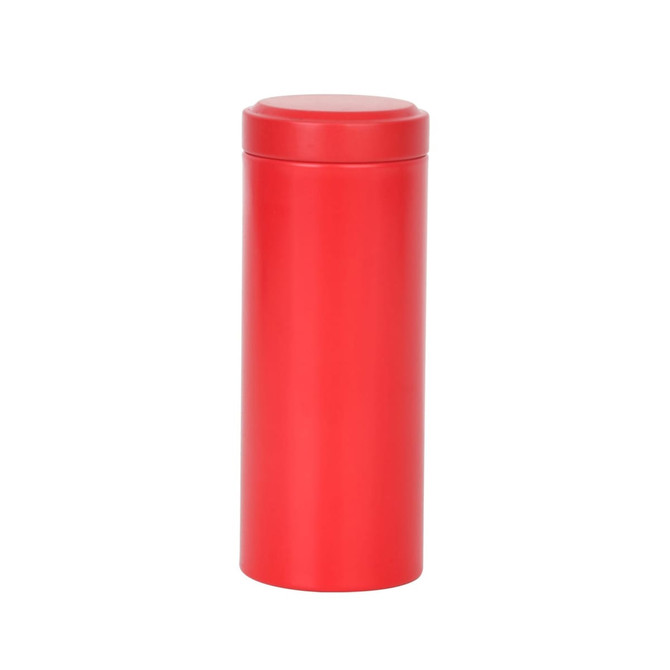 A large red metal cylinder tin canister with a smooth finish and a matching lid. A large red metal cylinder tin canister with a smooth finish and a matching lid.