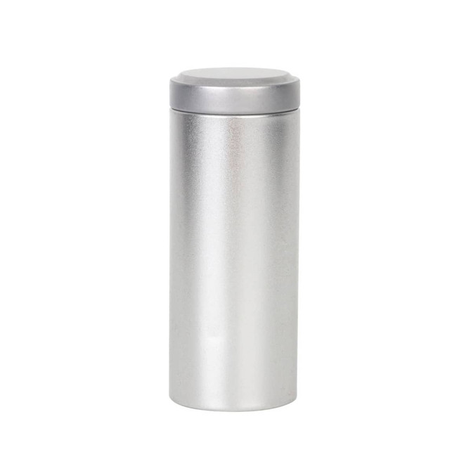 A large silver metal cylinder tin canister with a smooth, rounded lid. It features a logo. A large silver metal cylinder tin canister with a smooth, rounded lid. It features a logo.