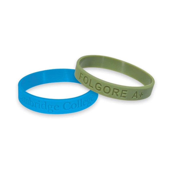 Two debossed silicone wristbands in blue and green, featuring distinct branding on each band. Two debossed silicone wristbands in blue and green, featuring distinct branding on each band.