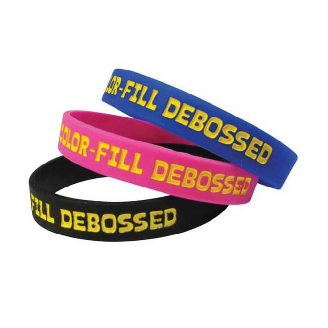 Three debossed silicone wristbands in pink, blue, and black, featuring yellow text and branding.