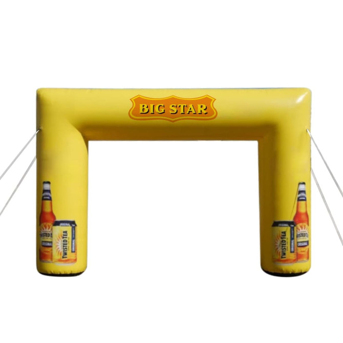 An inflatable yellow event arch featuring two drink bottles and a logo. Ideal for exhibitions and events.