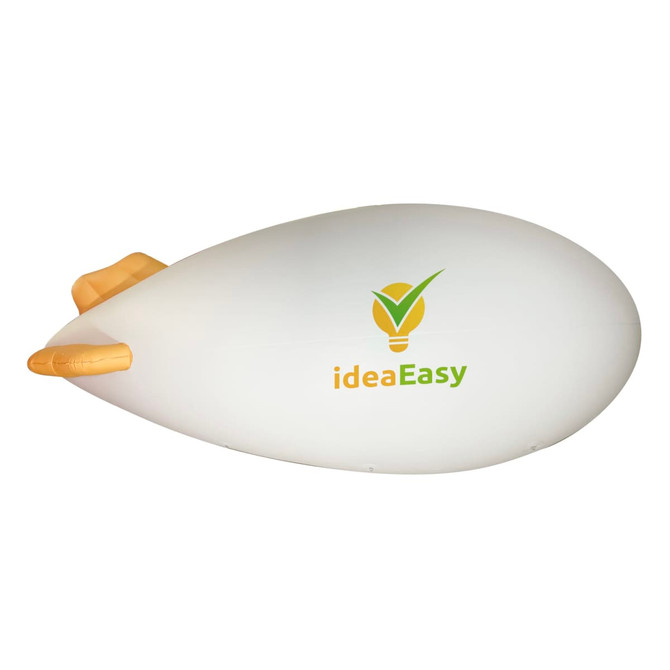 An inflatable blimp in white and gold, featuring a logo on the side.