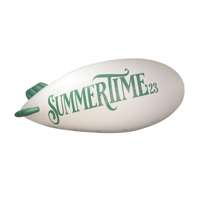 An inflatable blimp in white with green text featuring the word "SUMMERTIME" and a branding logo.