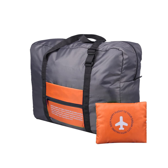 A grey travel compressed bag with an orange pocket and strap, alongside a matching compressed cushion.
