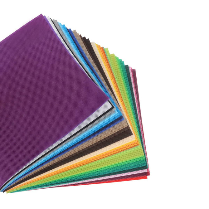 A collection of non-woven fabric sheets in various colours, arranged in a fan shape. Some sheets include a textured pattern.