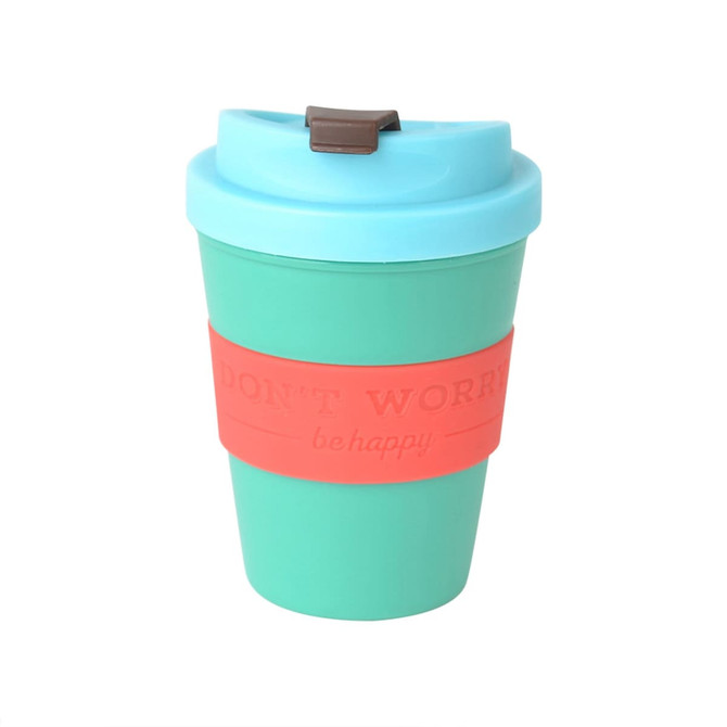 A reusable coffee cup in turquoise with a coral silicone sleeve and a light blue lid, featuring a logo.
