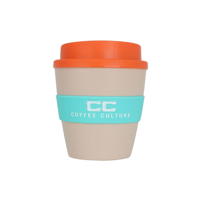 A reusable coffee cup made from rice husk fibre, featuring a beige body, orange lid, and teal band with a logo.