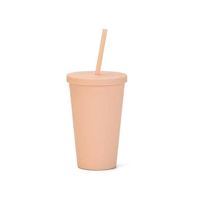 A 16oz matte plastic cup in a soft peach colour with a lid and a straw, featuring a logo.