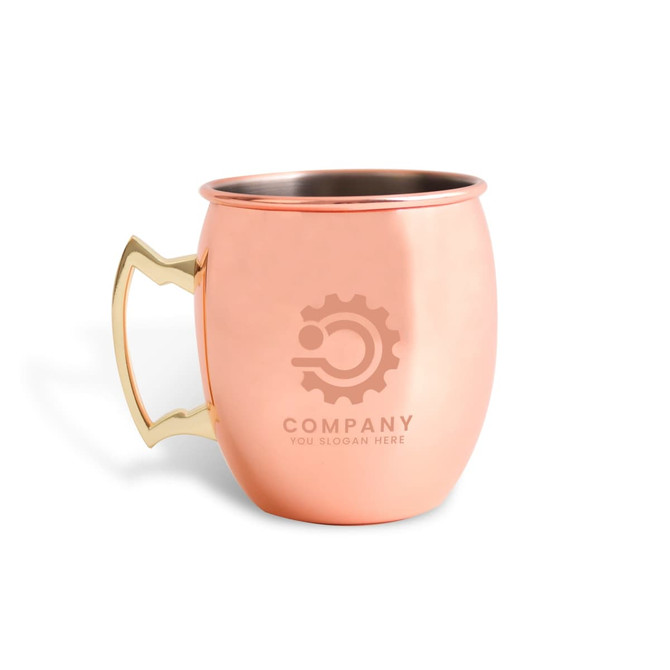 A copper Moscow mule mug with a smooth finish and a decorative handle, featuring a logo on its side.
