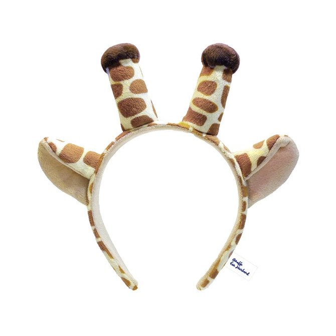 A giraffe-themed headband in brown and beige with ears and horns, featuring a logo on the side.