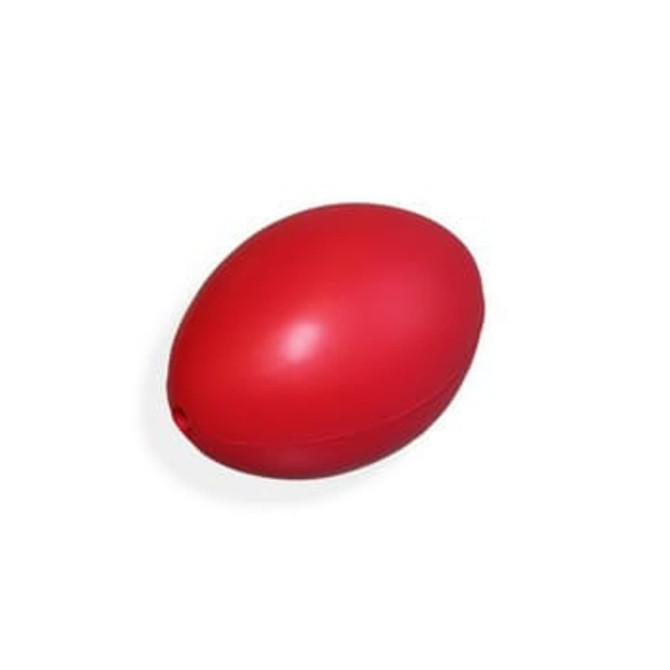 A red oval-shaped stress reliever, resembling a baseball, with a smooth finish and a logo.