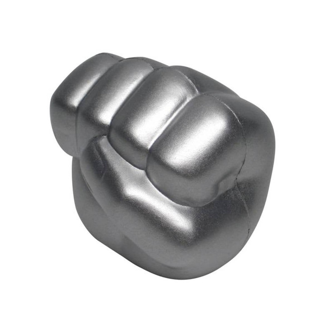 A silver clenched fist shape stress reliever with a smooth finish and rounded edges.