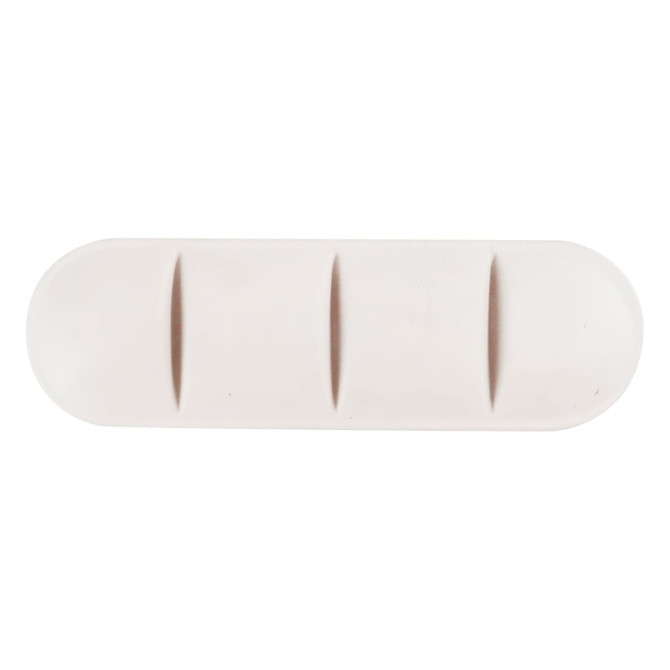 A large tablet-shaped stress reliever in a soft white colour, featuring three indented sections and a branding logo.