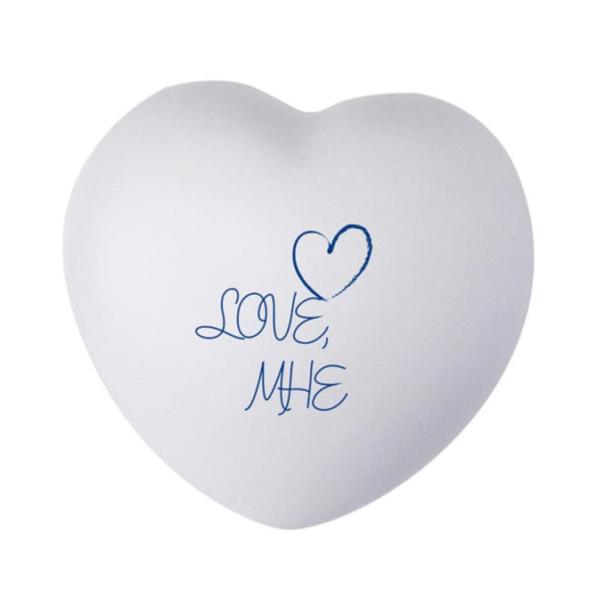 A white heart-shaped stress reliever with blue text reading "LOVE, ME". Features a smooth surface and rounded edges.