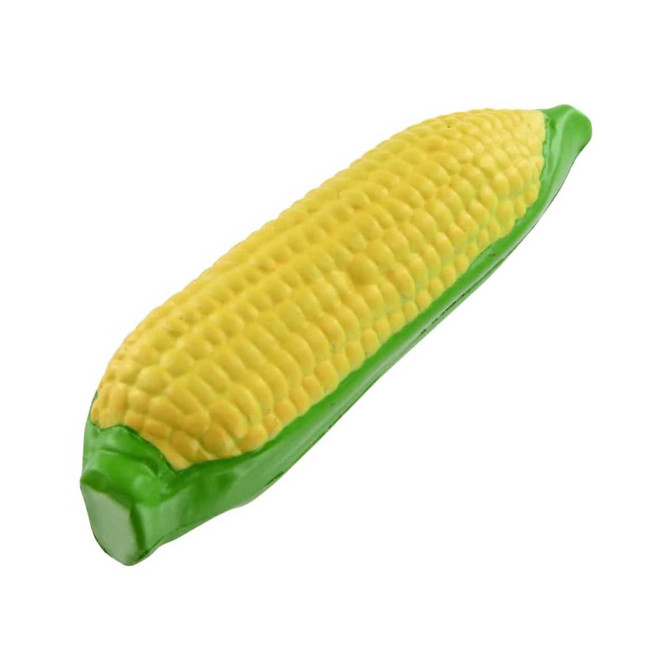 A yellow corn-shaped stress reliever with green accents, featuring a textured surface to resemble corn kernels.