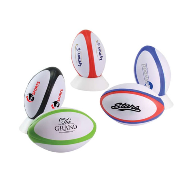 A variety of stress rugby balls in different colours, with several featuring logos and branding.