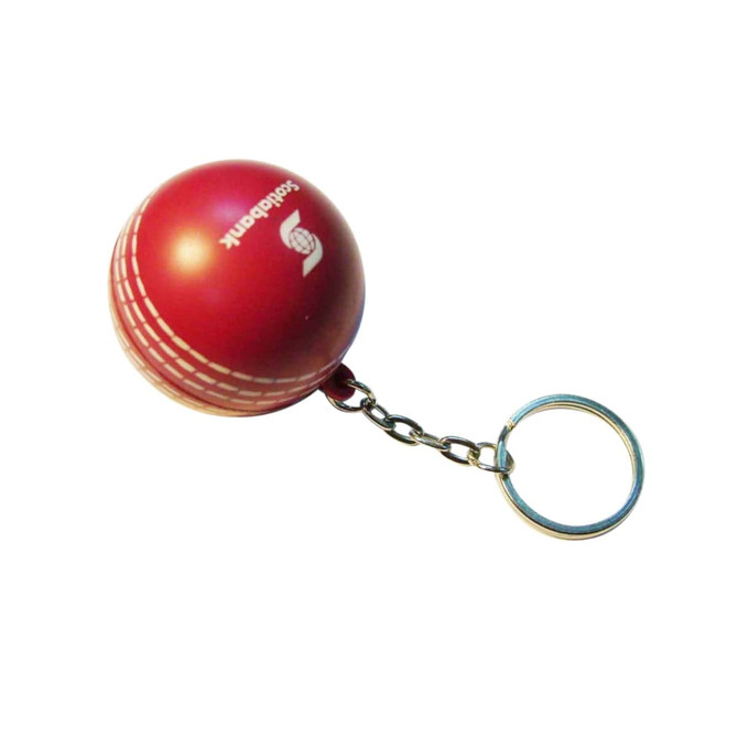 A red cricket ball stress reliever attached to a metal keyring, featuring a logo on its surface. A red cricket ball stress reliever attached to a metal keyring, featuring a logo on its surface.