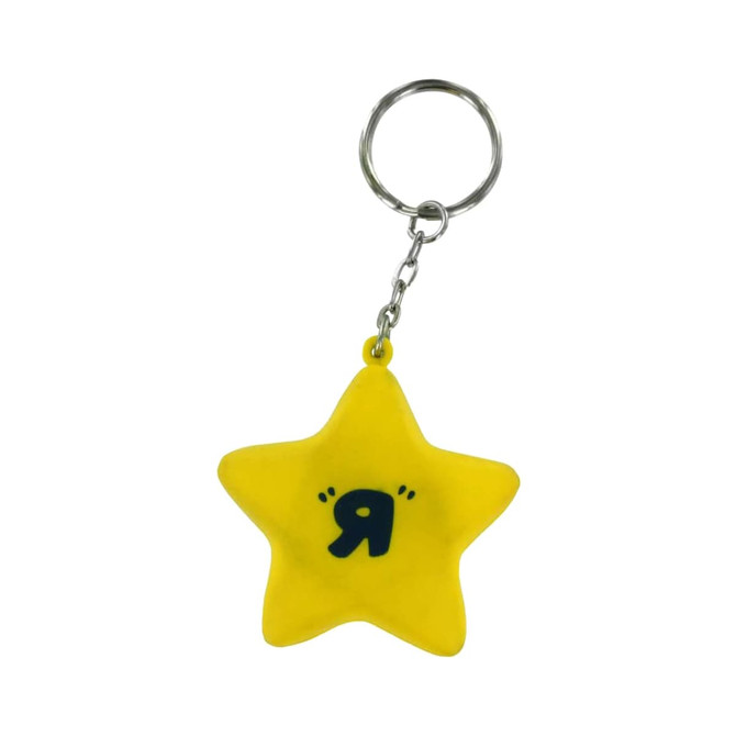 A yellow star-shaped stress reliever attached to a keyring, featuring a small symbol in black. A yellow star-shaped stress reliever attached to a keyring, featuring a small symbol in black.