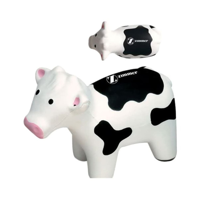 A milk cow-shaped stress reliever in white and black, featuring a logo on top.