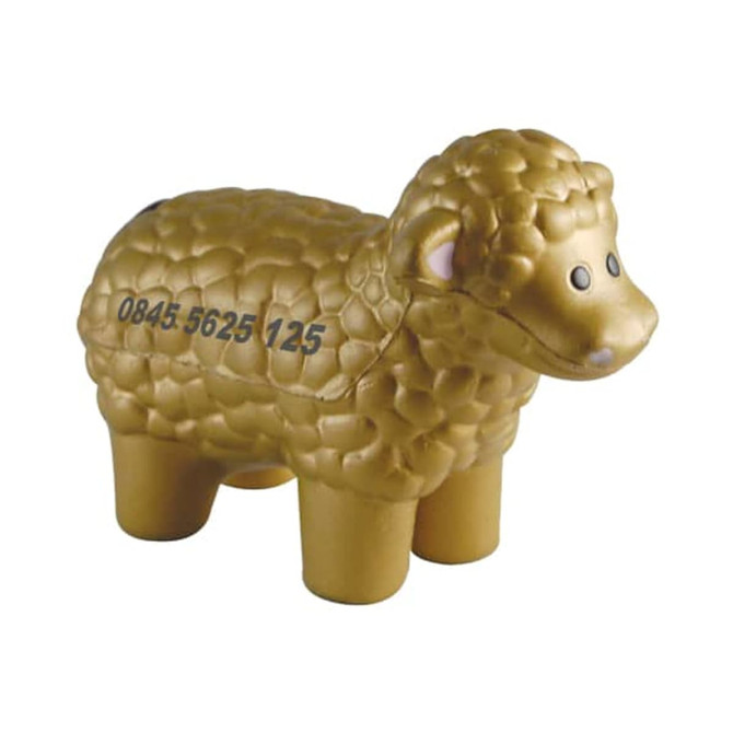 A golden sheep-shaped stress reliever with textured fur and a small logo on its side.
