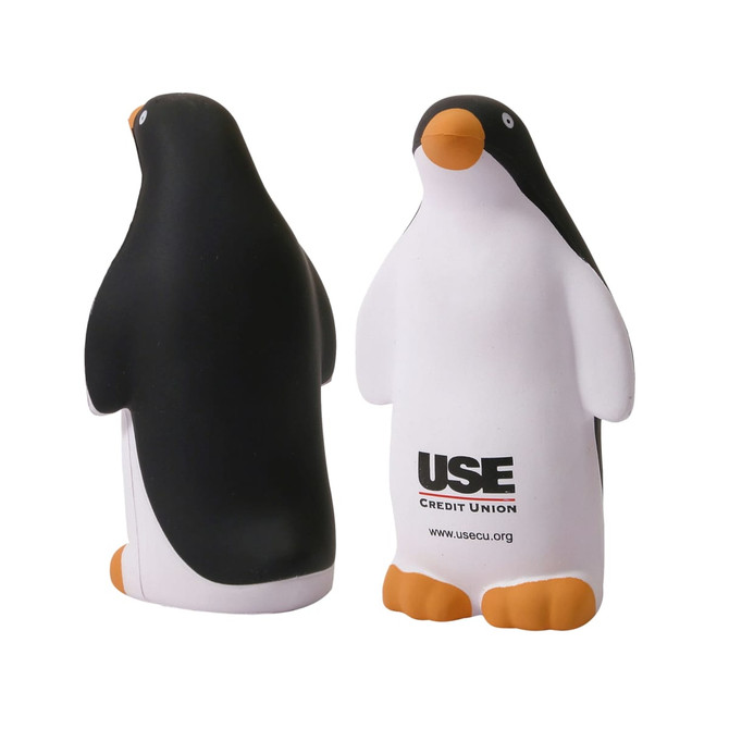 A penguin-shaped stress reliever in black, white, and orange, featuring a logo on its side.