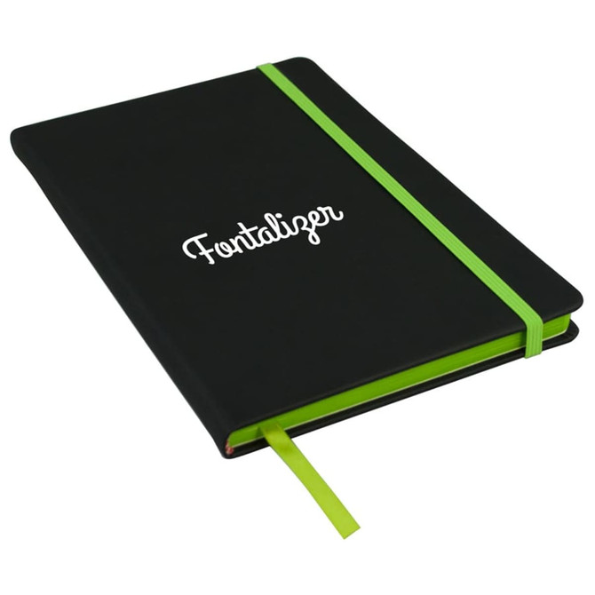 A black A5 journal with a green elastic band and a green ribbon marker. It features a branded logo on the cover.