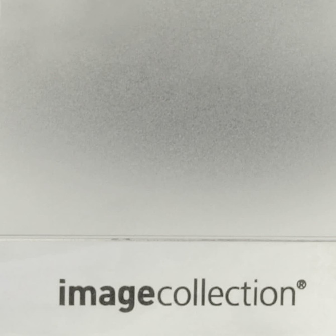 A sleek, silver deluxe pocket business card holder with a branding logo at the bottom.