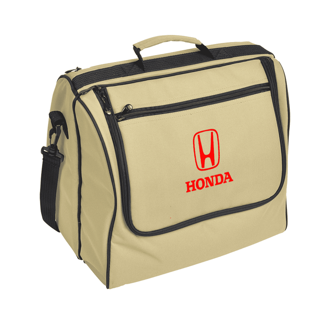 A beige picnic basket with a black trim and a front pocket, featuring a logo.