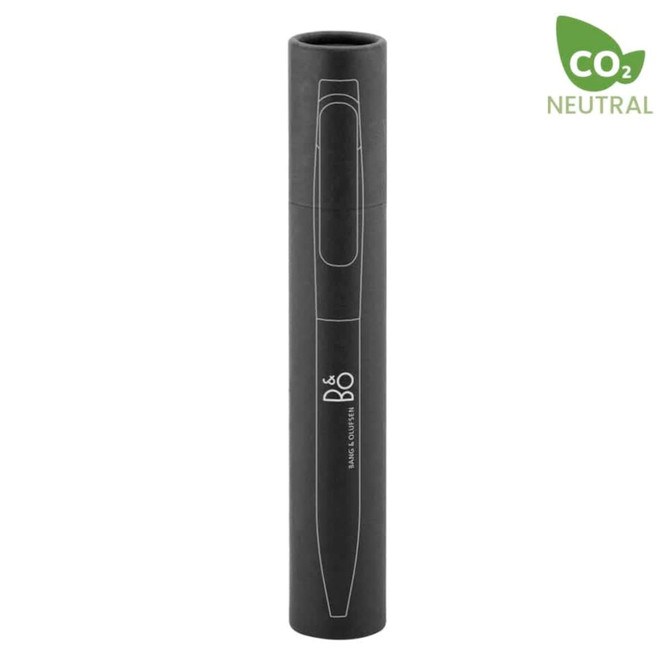 A black metal pen in a cylindrical container, featuring a logo and a CO2 neutral badge.
