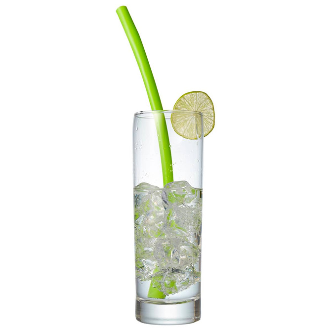 A tall glass filled with ice water and a bright green reusable silicone straw, garnished with a slice of lime.