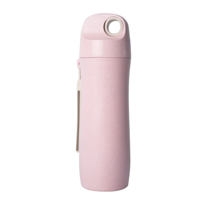 A drink bottle in pastel pink made from wheat straw, featuring a loop for easy carrying and a sleek design.
